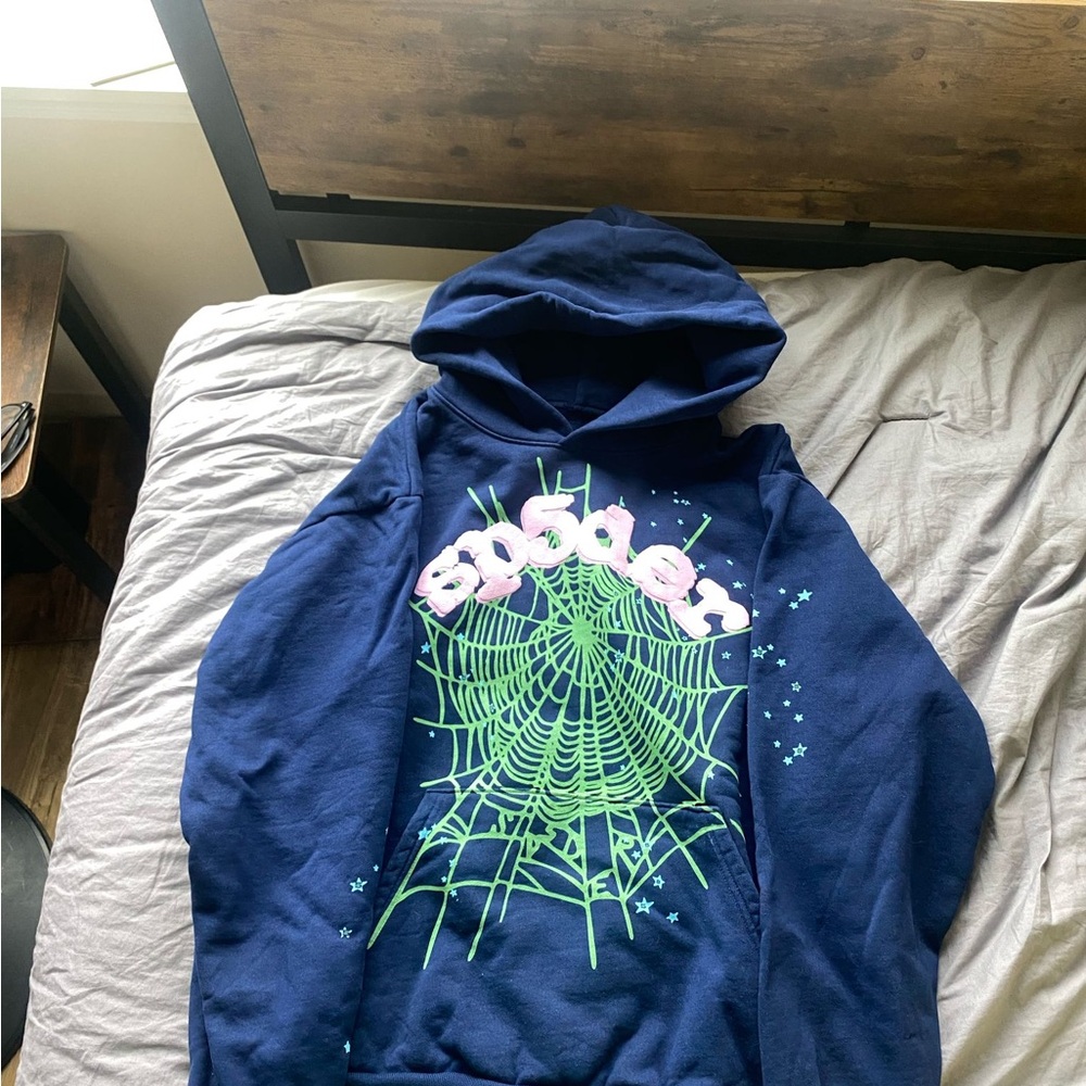Blue Hoodie with Green Web Design